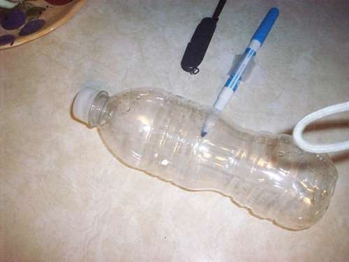 Name:  Cutting-The-Bottle.jpg
Views: 1891
Size:  15.1 KB