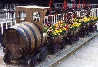 Name:  whiskey-barrel-train-garden-planter.jpg
Views: 7357
Size:  16.2 KB
